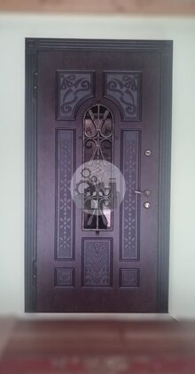входная дверь для дома с ковкой, отделка МДФ